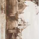 Photo:Front of church with school building on the left