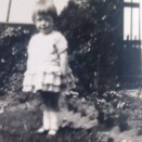 Photo:Jean Stein (Mrs Shirlaw), aged 3, in the garden of Beechwood Cottage, c.1930.