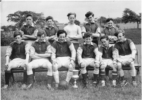 Photo:Loganlea Miners' Welfare Club youth football team, early 1960s.  Back row, L-R: J. Lavery, H. Cameron, W. Forsyth, J. Rafferty, R. Burnet.  Front, L-R: J. O'Hara, H. Campbell, J. McAuley, Hugh Kelly (captain), D. Size, P. McKenna.