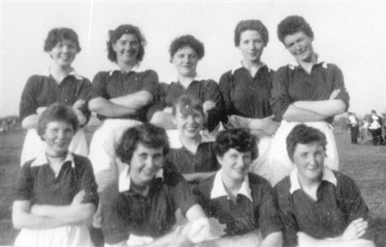 Photo:Ladies' football team, Loganlea, at a gala day, 1960s.   Back Row, L-R: M. Darcy, unknown, A. Steele, R. Young, C. Toner (now lives in Cincinnati, Ohio).  Front L-R: H. Darcy, M. Johnston, R. Yeardley, M. Steele, M. Kelly.  Thanks to Catherine Alleyne, Billy Kane and Anne Cassidy Hamilton for this information.