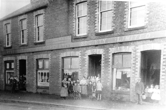 Photo:Addiewell branch of West Calder Co-operative, with the Institue Hall above.
