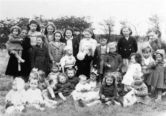 Photo:Loganlea Gala Day, 1946 or 1947.  Who are they?  And where are they now?  If you know, tell us.   Baby front right is David Pennykid.  Girl back row on the left, wearing a frilly top, Betty Oliver.