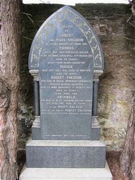 Photo:The Sneddons' gravestone in West Calder Cemetery.